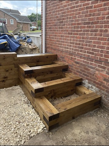 Driveway, sleeper walls and oak porch