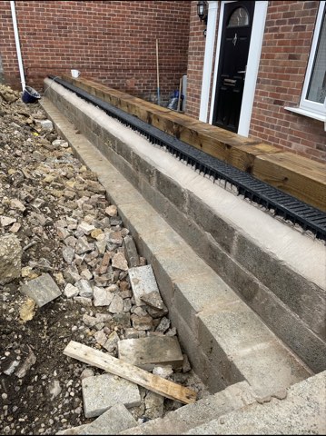 Driveway, sleeper walls and oak porch