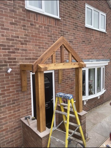 Driveway, sleeper walls and oak porch