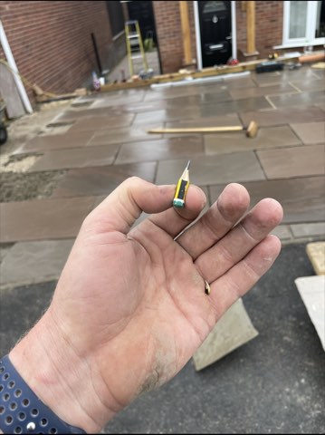 Driveway, sleeper walls and oak porch