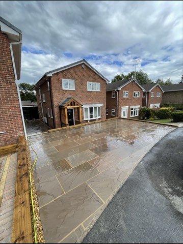 Driveway, sleeper walls and oak porch