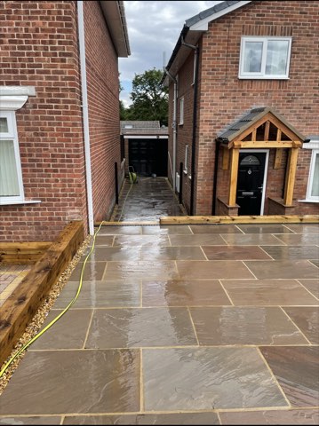 Driveway, sleeper walls and oak porch