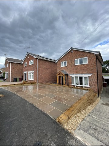 Driveway, sleeper walls and oak porch