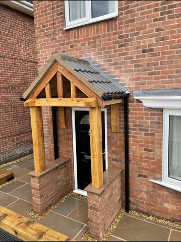 Driveway, sleeper walls and oak porch