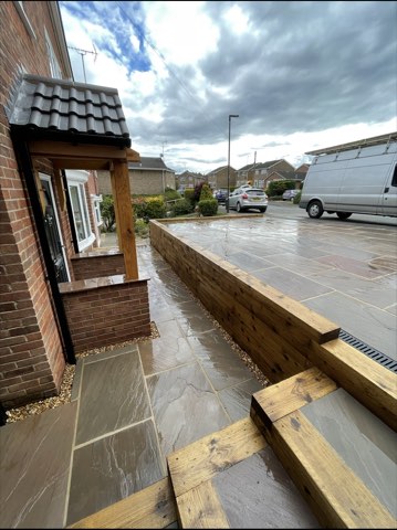 Driveway, sleeper walls and oak porch