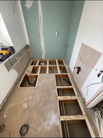 Bathroom, back to the joists