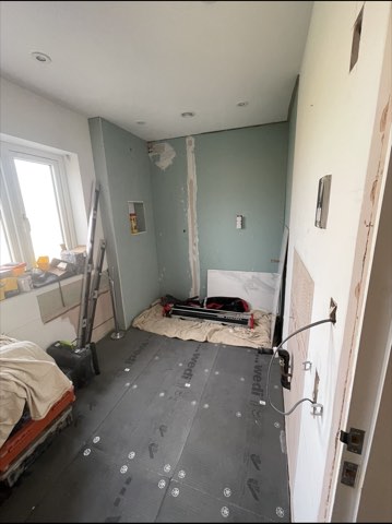 Bathroom, back to the joists