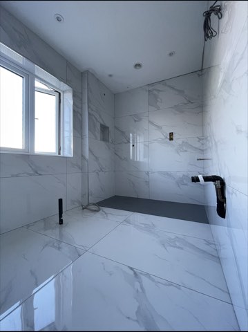 Bathroom, back to the joists