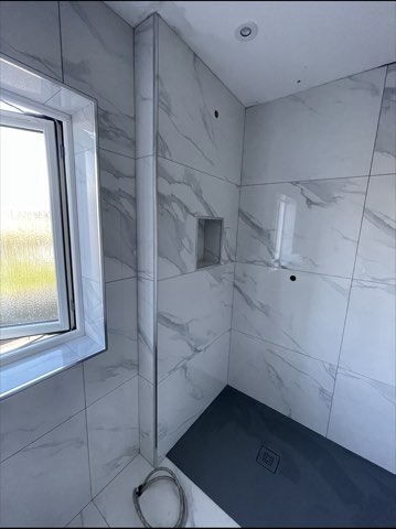 Bathroom, back to the joists
