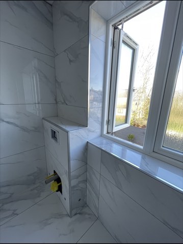 Bathroom, back to the joists